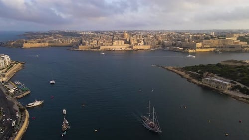Stunning aerial vista capturing Valletta's fortified peninsula jutting into the Mediterranean, with