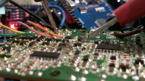 troubleshooting arduino electronics with a multimeter, close up view led flashing. Sience build.