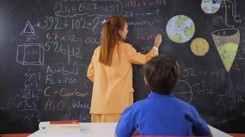 A teacher giving language lessons to a boy student.