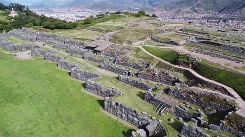 Terraced fields with stone walls of old culturally significant site in Peru, aerial