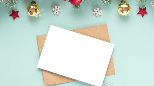 Christmas Greeting Card and Envelope with Snowy Fir Tree Branches Gift Boxes Decorations and Pine