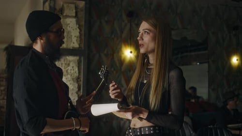 Musician and Singer Working Together on Song