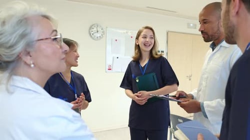 Medical Professionals Discussing Patient Care in Hospital