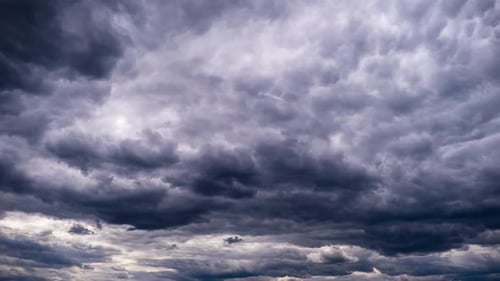 Dramatic Dark Clouds Moving Across the Horizon