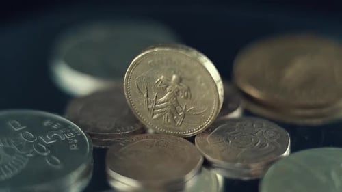 video of vintage rare coins, retro money edition, old gold, on a 360 rotating stand, 120 fps slow mo