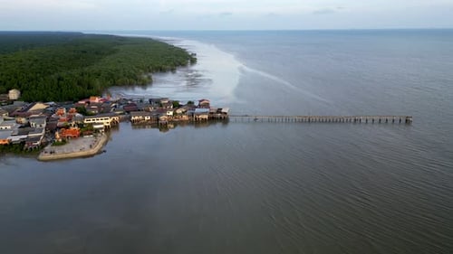 A small town is located on the shore. Aerial scenery of Segenting, Batu Pahat.