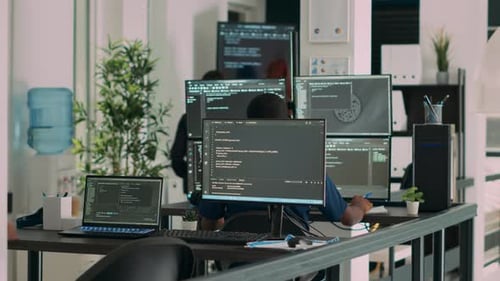 Multiethnic Group of Programers Working on Server Code to Develop New Database