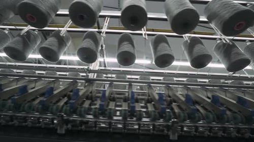 Spinning Factory Production of Fabrics Thread of Silk Linen and Synthetics View of Spools of Thread