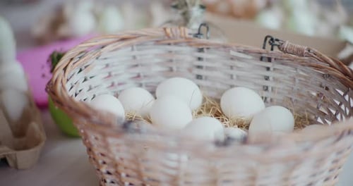 Easter Eggs In Bascet At Holiday Table