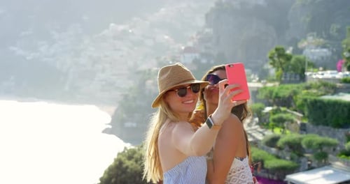 Women Take Selfie at Beautiful Coastal Destination
