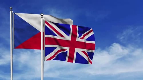 Czech Republic and United Kingdom Flags Waving Against Blue Sky
