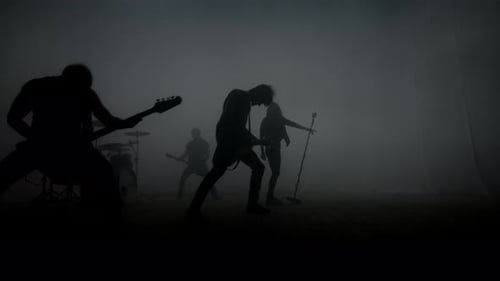 Rock Music Concert. Rock Band Concert. Silhouettes of Rock Group on Concert