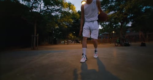 Two Basketball Players Play Street Ball Outside