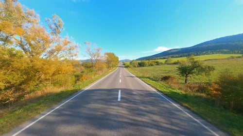 Maneuverable Flight in Countryside Valley Empty Asphalt Country Road Highway Between Agricultural