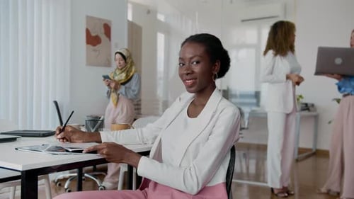 African American Businesswoman Working In Office
