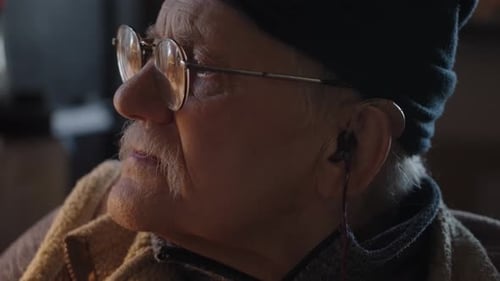 Close Up of Senior Person with Hearing Aid