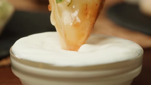 Dipping Dimsun Into White Sauce Closeup Macro Dim Sun Gedza Dumplings Spring Rolls on the Table Food