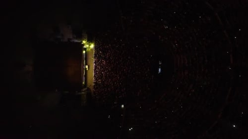 Aerial View of Crowded Amphitheater at Night