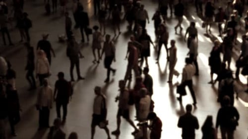 Crowds of Pedestrians Commuting in City Business District at Rush Hour Traffic