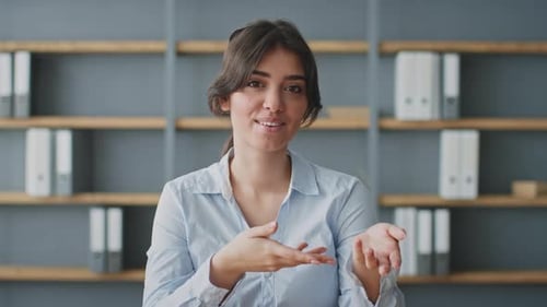 Engaging Young Teacher Conducting Online Lessons From Her Modern Home Office