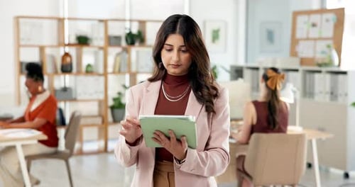 Tablet, smile and businesswoman in office with research for creative project with publishing