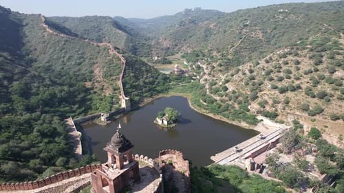 Drone shot of Amer Sagar Lake next to amer fort and jaigadh fort in amer jaipur rajasthan