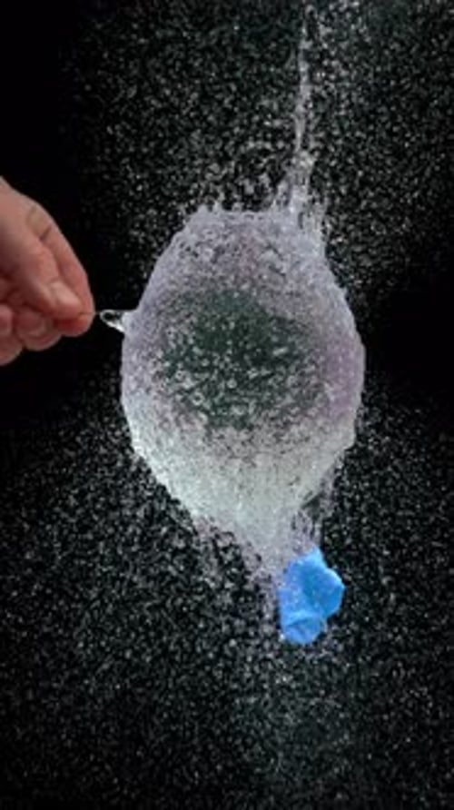 Water Balloon Bursting in Slow Motion Close Up
