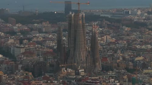 Aerial View of Barcelona City Skyline and Sagrada Familia Cathedral at Sunset