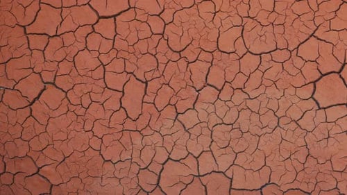 Aerial View of Dry, Cracked Desert Soil
