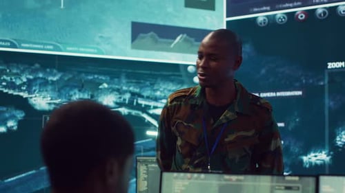 Military Men Discussing Strategy in Operations Center