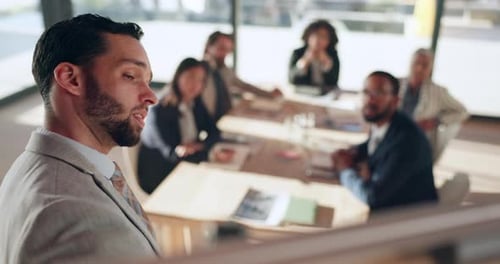 Business Meeting with Presentation in Modern Office