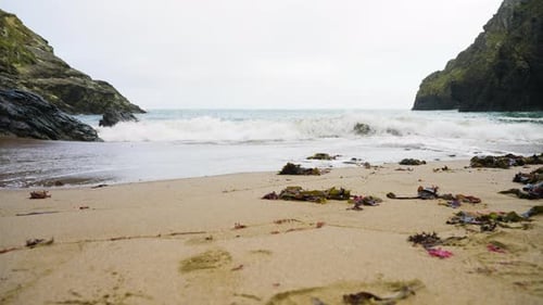 Quiet Sandy Beach In Evening Light Slow Motion Crashing Waves