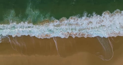 Aerial View on Turquiose Sea Waves Breaking on Sandy Coastline Top Down View on Blue Turquoise Ocean