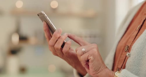 Adult Woman Using Mobile Phone Close Up