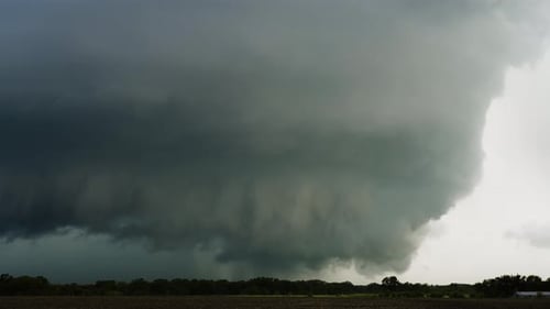 Powerful Supercell Thunderstorm Spins Across Open Fields.