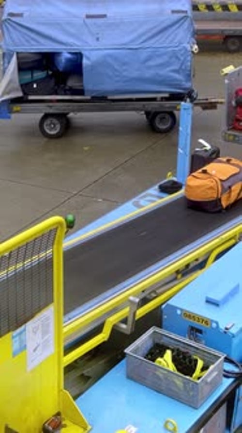 Bags on Baggage Carousel at Airport