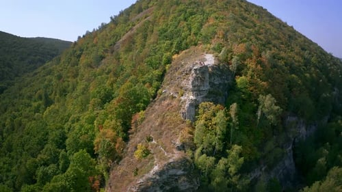 Hikers on the rock. Group of hikers stand on top of the rock ( Camel Rock) and enjoy the view. Zhigu