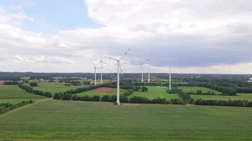 Wind turbines next to highway
