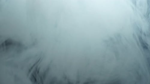 Wispy White Smoke on Black Background Abstract Footage