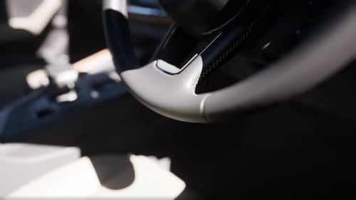 Modern Car Steering Wheel Turning While Driving