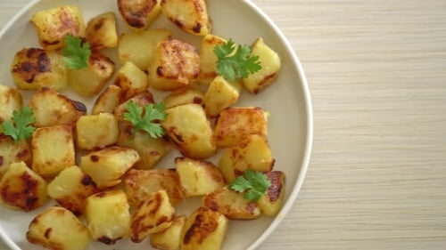 Delicious Roasted Potatoes with Parsley Close Up