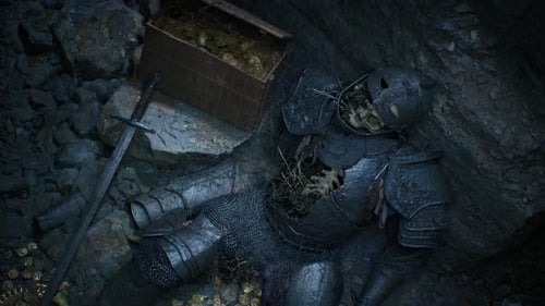 Un chevalier déchu repose près d'un coffre au trésor doré dans une grotte sombre