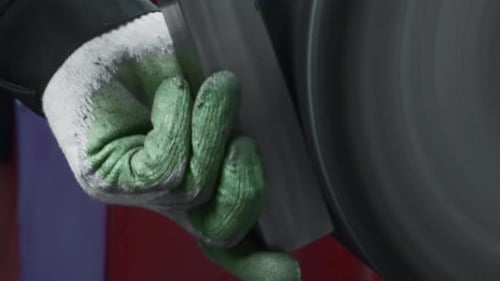 Metal Grinding Wheel in Factory Workplace Close Up