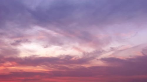 Colorful Clouds Shifting During Sunrise or Sunset
