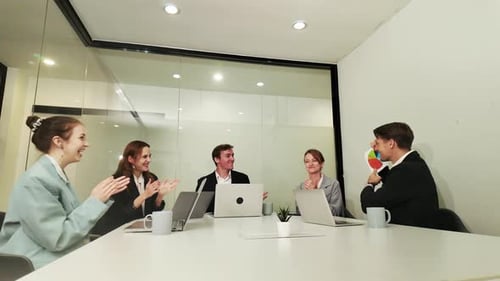 Young businesswoman talking during meeting in the office