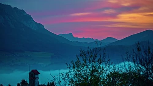 Central Alps, Austria, Europe - A Sight of Fog in the Mountains at Sunset - Timelapse