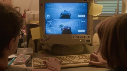 Children Playing Retro Racing Game on Old Computer