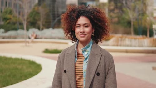 Portrait of a Happy Woman in the City