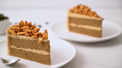 homemade coffee almonds cake on white plate