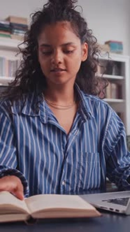 Young Woman Working Diligently at Home Office in India